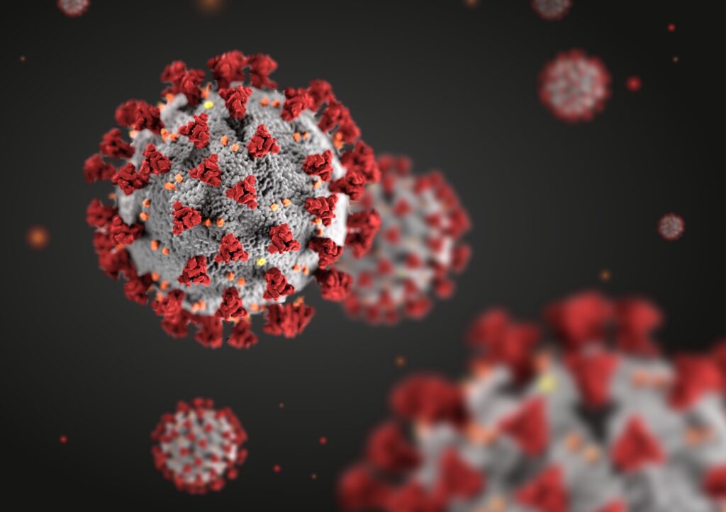 Närbild av ett Coronavirus mot svart bakgrund